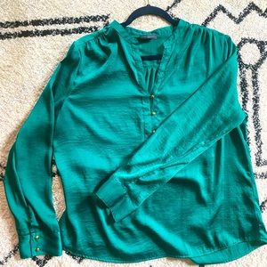 Saturated Emerald green long sleeve silk blouse.